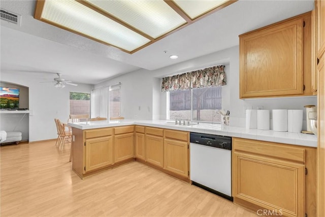 16737 Windcrest Dr, Fontana, CA 92337 - kitchen featuring dishwasher, light wood-style floors, a ceiling fan, a peninsula, and recessed lighting