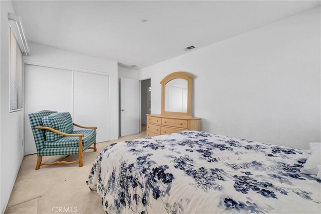 16737 Windcrest Dr, Fontana, CA 92337 - bedroom featuring a closet and light colored carpet