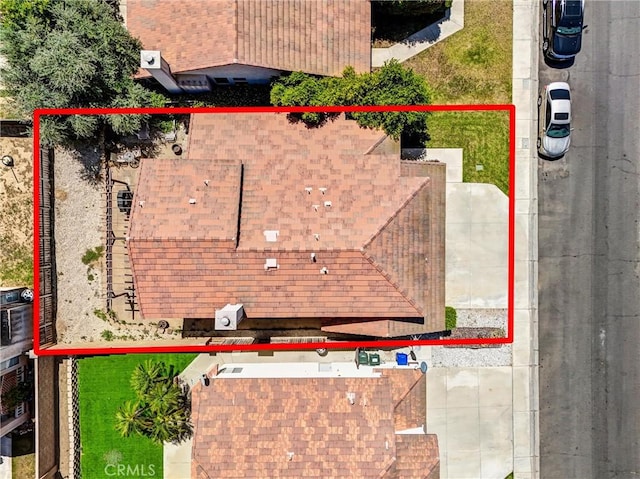 16737 Windcrest Dr, Fontana, CA 92337 - aerial view of property and surrounding area featuring property parcel outlined
