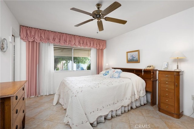 28839 Carmel Rd, Menifee, CA 92586 - bedroom with light tile patterned floors and a ceiling fan