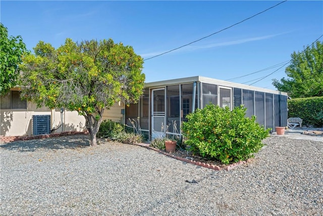 28839 Carmel Rd, Menifee, CA 92586 - back of property featuring a sunroom
