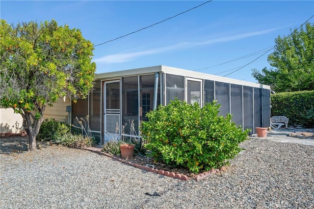 28839 Carmel Rd, Menifee, CA 92586 - view of home's exterior with a sunroom