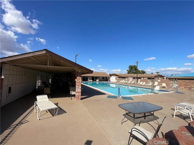 28839 Carmel Rd, Menifee, CA 92586 - community pool with a patio area