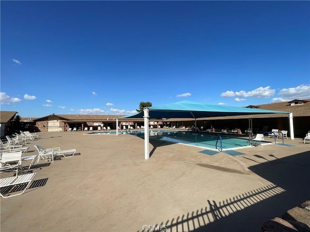 28839 Carmel Rd, Menifee, CA 92586 - community pool featuring a patio
