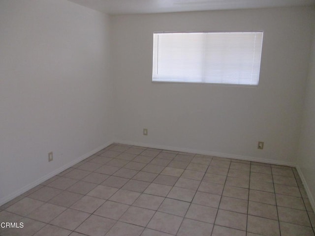 44244 Carolside Ave, Lancaster, CA 93535 - unfurnished room featuring light tile patterned floors and baseboards