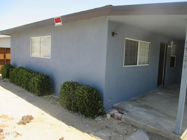 44244 Carolside Ave, Lancaster, CA 93535 - view of side of home with stucco siding