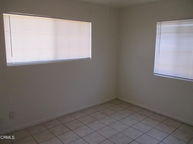 44244 Carolside Ave, Lancaster, CA 93535 - unfurnished room with baseboards and light tile patterned floors