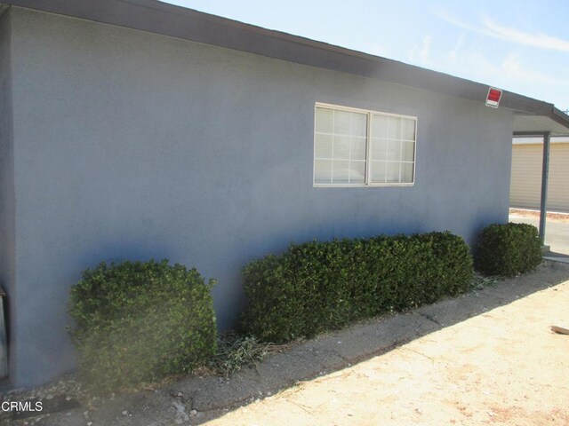 44244 Carolside Ave, Lancaster, CA 93535 - view of side of property with stucco siding