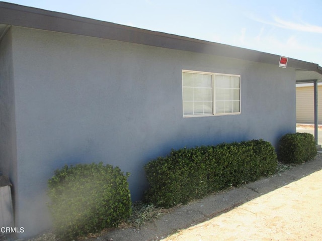 44244 Carolside Ave, Lancaster, CA 93535 - view of side of home with stucco siding