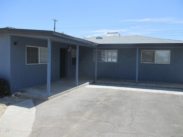 44244 Carolside Ave, Lancaster, CA 93535 - back of house with stucco siding and a shingled roof