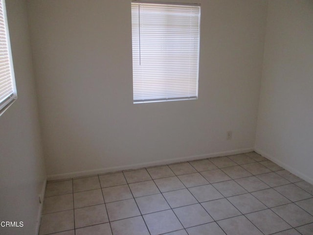 44244 Carolside Ave, Lancaster, CA 93535 - spare room with baseboards and light tile patterned flooring