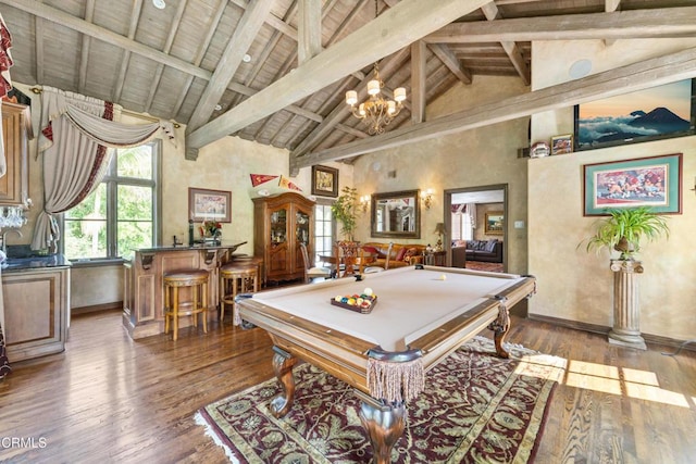 1205 Linda Vista Ave, Pasadena, CA 91103 - rec room with pool table, high vaulted ceiling, wood finished floors, a chandelier, and bar area