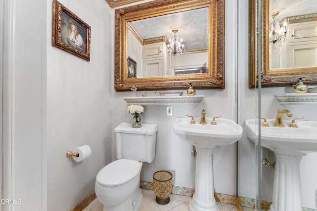 1205 Linda Vista Ave, Pasadena, CA 91103 - bathroom featuring tile patterned flooring, a chandelier, and decorative columns