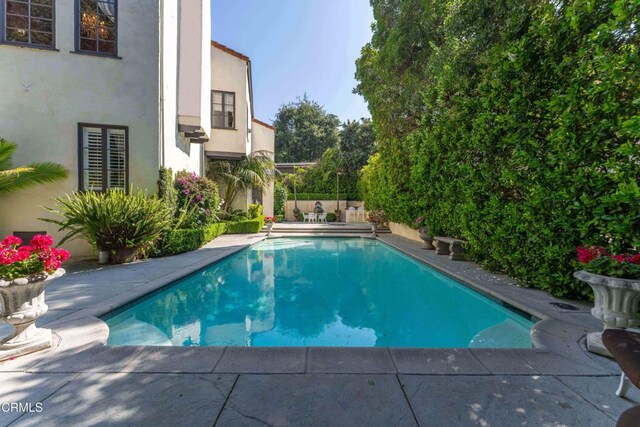 1205 Linda Vista Ave, Pasadena, CA 91103 - view of swimming pool with a patio