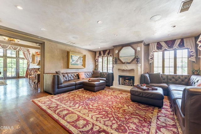 1205 Linda Vista Ave, Pasadena, CA 91103 - living room with wood finished floors, a lit fireplace, french doors, ornamental molding, and recessed lighting