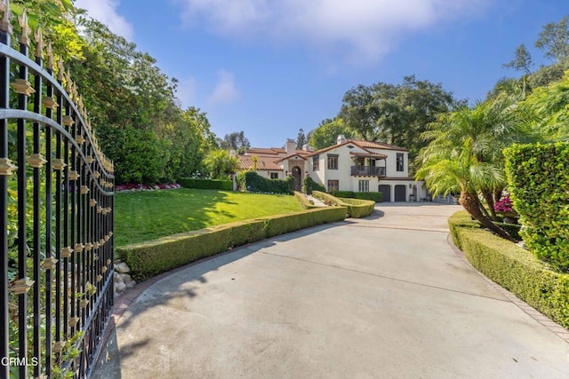 1205 Linda Vista Ave, Pasadena, CA 91103 - mediterranean / spanish house with a front lawn and concrete driveway
