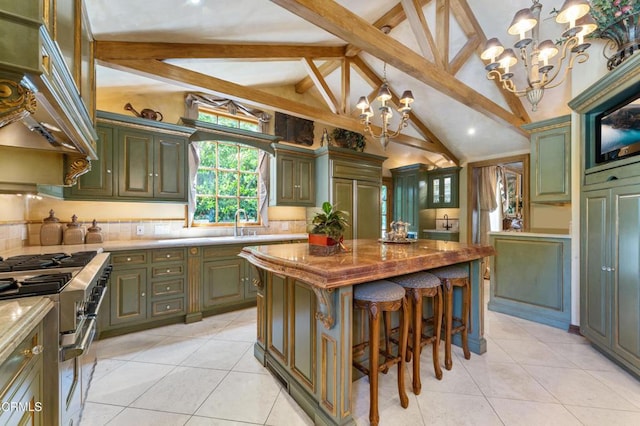 1205 Linda Vista Ave, Pasadena, CA 91103 - kitchen featuring high end appliances, a chandelier, green cabinets, and light tile patterned floors