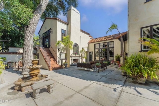 1205 Linda Vista Ave, Pasadena, CA 91103 - view of patio / terrace featuring outdoor lounge area and stairway