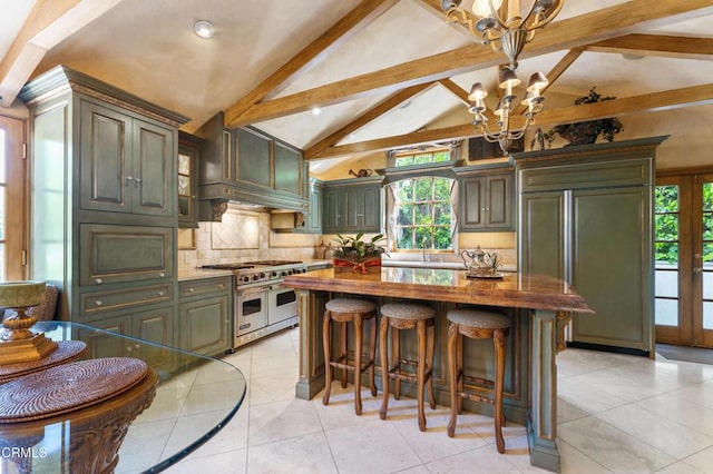 1205 Linda Vista Ave, Pasadena, CA 91103 - kitchen with high quality appliances, a chandelier, healthy amount of natural light, backsplash, and recessed lighting
