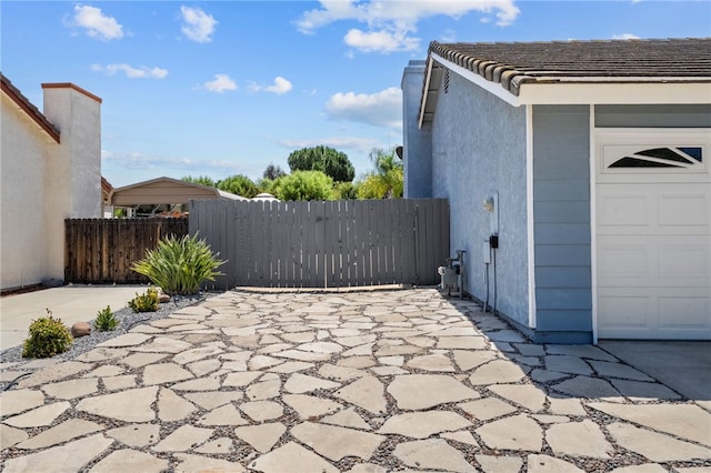 32618 Durango Ct, Wildomar, CA 92595 - view of patio / terrace featuring a garage