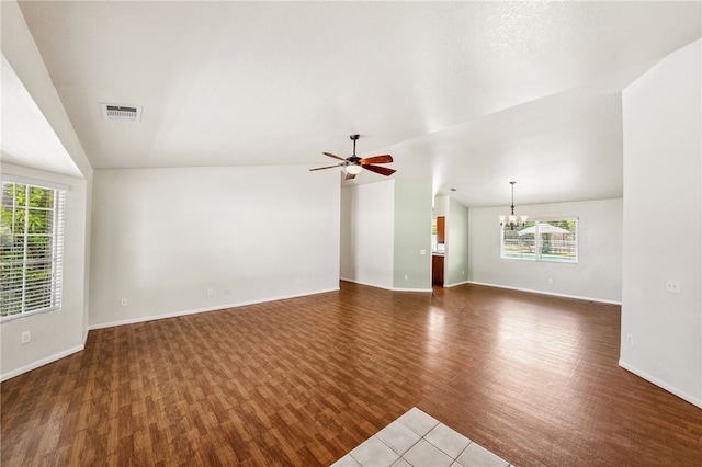 32618 Durango Ct, Wildomar, CA 92595 - unfurnished living room with a chandelier, wood finished floors, ceiling fan, plenty of natural light, and vaulted ceiling