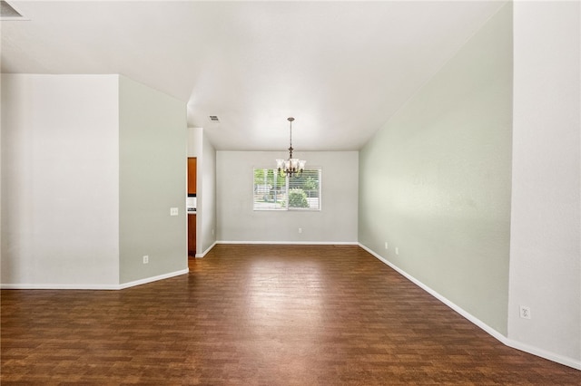 32618 Durango Ct, Wildomar, CA 92595 - unfurnished room with a chandelier, dark wood finished floors, and lofted ceiling