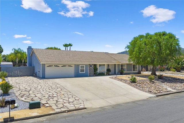 32618 Durango Ct, Wildomar, CA 92595 - single story home featuring a garage, driveway, a chimney, stucco siding, and a tiled roof
