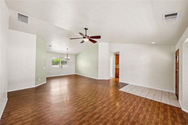 32618 Durango Ct, Wildomar, CA 92595 - empty room with ceiling fan, a chandelier, wood finished floors, and lofted ceiling