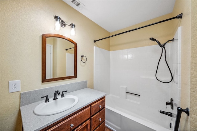 32618 Durango Ct, Wildomar, CA 92595 - bathroom featuring vanity, bathtub / shower combination, and a textured wall