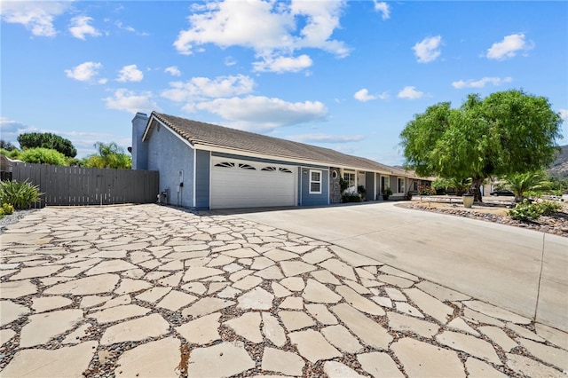 32618 Durango Ct, Wildomar, CA 92595 - ranch-style house featuring a garage, driveway, a tiled roof, and stucco siding