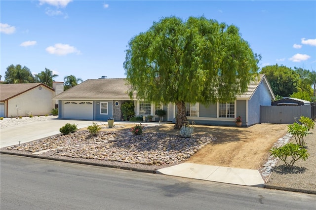 32618 Durango Ct, Wildomar, CA 92595 - ranch-style house with concrete driveway, a tile roof, a garage, a gate, and stucco siding
