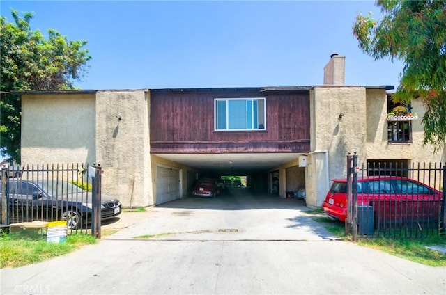 11131 Dodson St Unit 7, El Monte, CA 91733 - multi unit property featuring a carport, a chimney, and concrete driveway