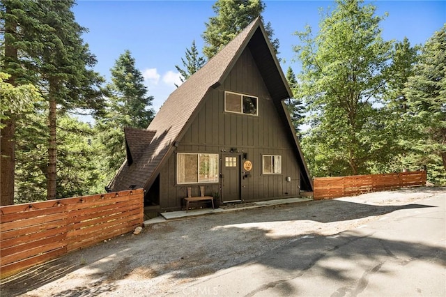 350 S Fairway Dr, Lake Arrowhead, CA 92352 - rear view of house with board and batten siding and roof with shingles