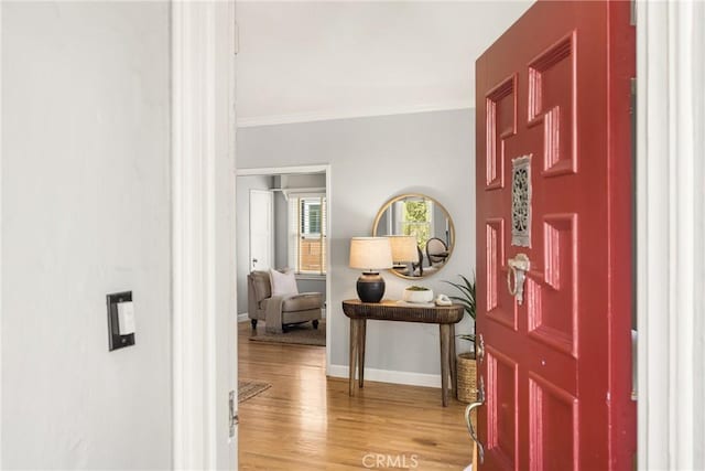 2412 Santiago St, Santa Ana, CA 92706 - foyer entrance featuring ornamental molding and light wood-style flooring