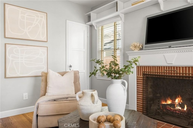 2412 Santiago St, Santa Ana, CA 92706 - living area featuring a brick fireplace and wood finished floors