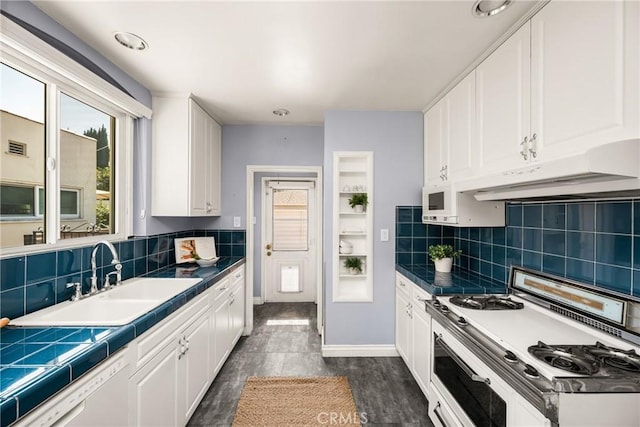 2412 Santiago St, Santa Ana, CA 92706 - kitchen with white appliances, under cabinet range hood, and white cabinets