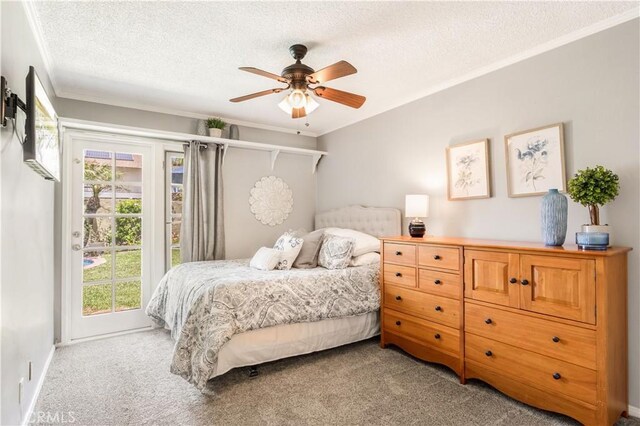3191 Woodstock Rd, Rossmoor, CA 90720 - bedroom with carpet flooring, crown molding, a textured ceiling, multiple windows, and access to outside
