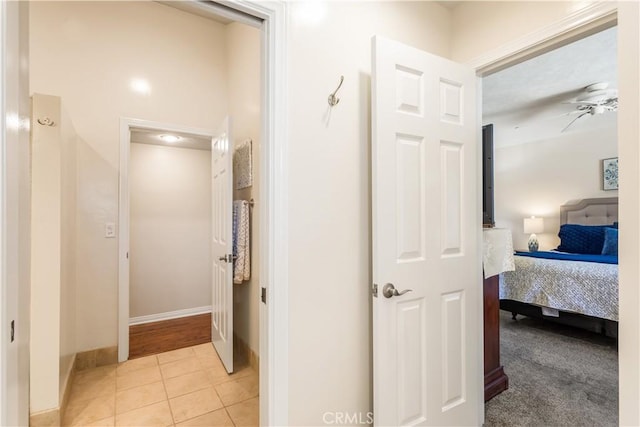 3191 Woodstock Rd, Rossmoor, CA 90720 - corridor featuring light tile patterned floors and baseboards