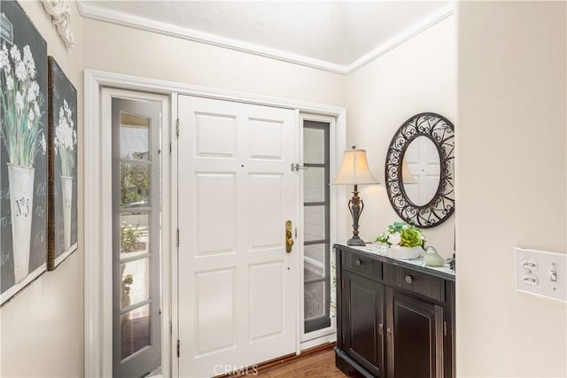 3191 Woodstock Rd, Rossmoor, CA 90720 - entryway with healthy amount of natural light, wood finished floors, and crown molding