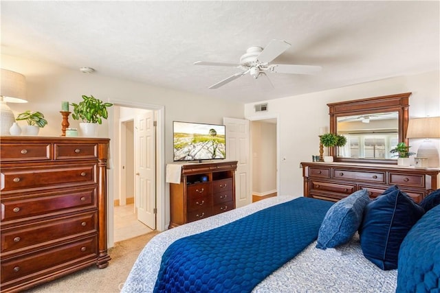 3191 Woodstock Rd, Rossmoor, CA 90720 - bedroom with light colored carpet and ceiling fan