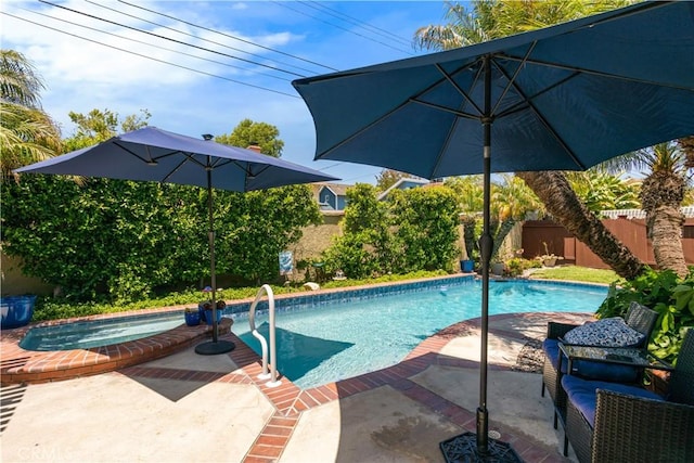 3191 Woodstock Rd, Rossmoor, CA 90720 - view of swimming pool with a fenced backyard, an in-ground hot tub, and a patio area