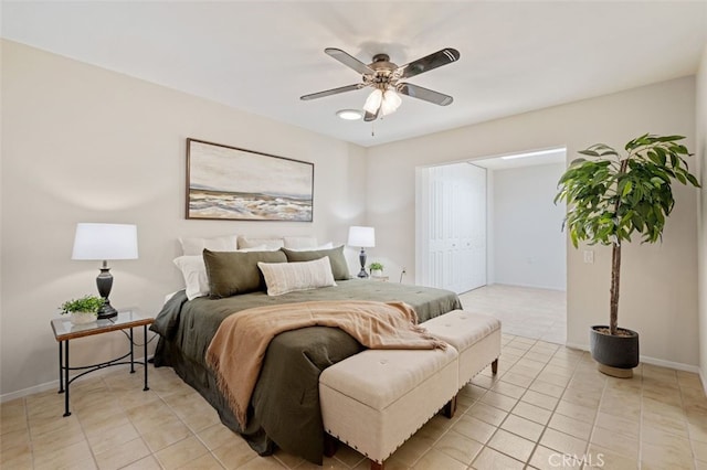 5520 Via La Mesa Unit A, Laguna Woods, CA 92637 - bedroom featuring light tile patterned floors and ceiling fan
