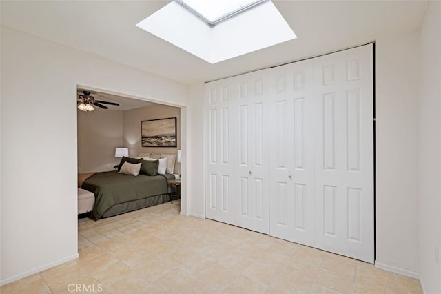 5520 Via La Mesa Unit A, Laguna Woods, CA 92637 - bedroom with a skylight and baseboards