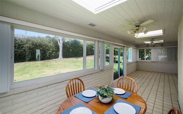 5520 Via La Mesa Unit A, Laguna Woods, CA 92637 - sunroom / solarium with a skylight, a ceiling fan, brick wall, and tile patterned floors