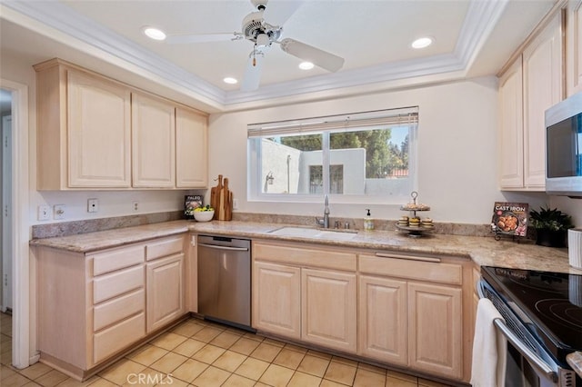 5520 Via La Mesa Unit A, Laguna Woods, CA 92637 - kitchen with stainless steel appliances, light brown cabinets, a raised ceiling, light tile patterned floors, and a ceiling fan