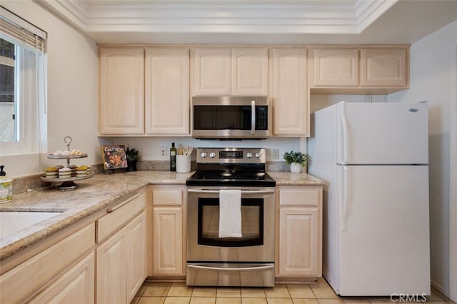 5520 Via La Mesa Unit A, Laguna Woods, CA 92637 - kitchen featuring appliances with stainless steel finishes, light brown cabinetry, crown molding, light stone countertops, and light tile patterned floors