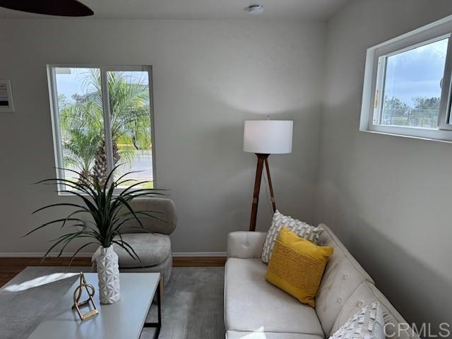 4454 Ute Dr, San Diego, CA 92117 - living area featuring wood finished floors