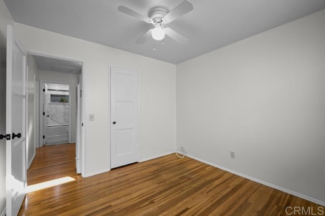 4454 Ute Dr, San Diego, CA 92117 - unfurnished bedroom with wood finished floors, attic access, and ceiling fan