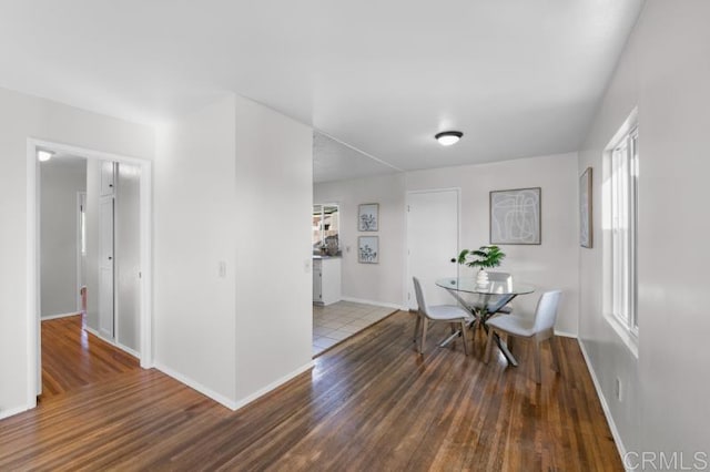 4454 Ute Dr, San Diego, CA 92117 - dining room featuring wood finished floors and baseboards