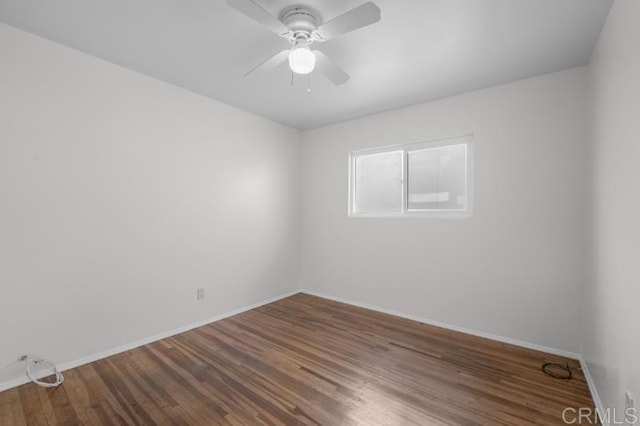 4454 Ute Dr, San Diego, CA 92117 - empty room with wood finished floors and a ceiling fan